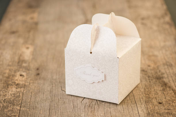 Paper gift box on wooden background