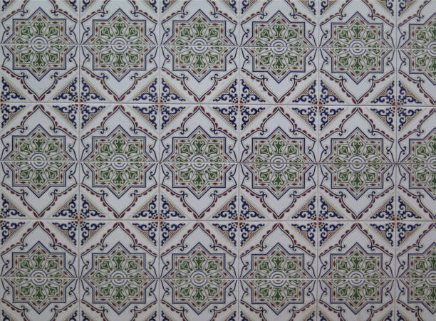 istock Wall tiled with green floral ceramic tiles 654585056