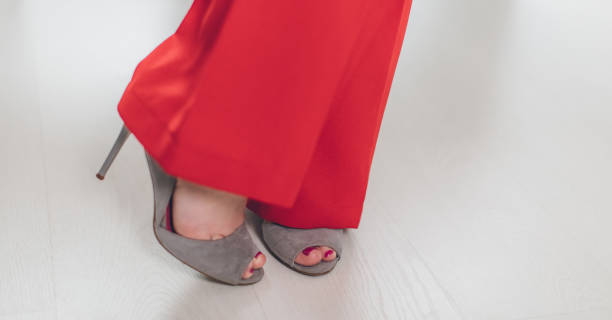 istock Woman in red shoes 654587756