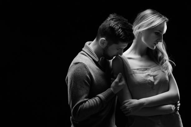 istock Bofriend kissing his girlfriend on her shoulder 654591028