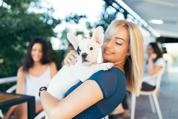 istock Woman with dog in cafe 654604002