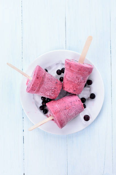 Homemade fruit blackcurrant blueberry popsicles