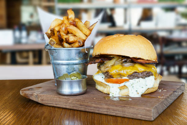 Beef cheese burger chaddar cheese tartar sauce stock photo