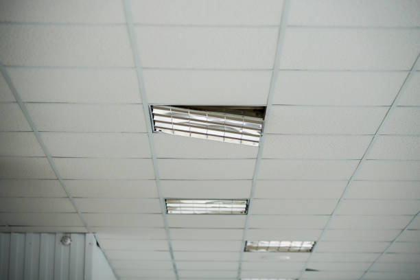 istock the construction of the ceiling, a broken Ceiling lamp 654609228