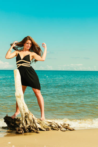 istock Beautiful sexy girl on seashore 654620806