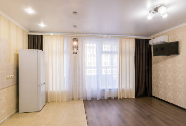 istock The interior of a small room studio renovated unfurnished 654627520