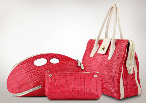 istock Red women bags on grey background 654631290