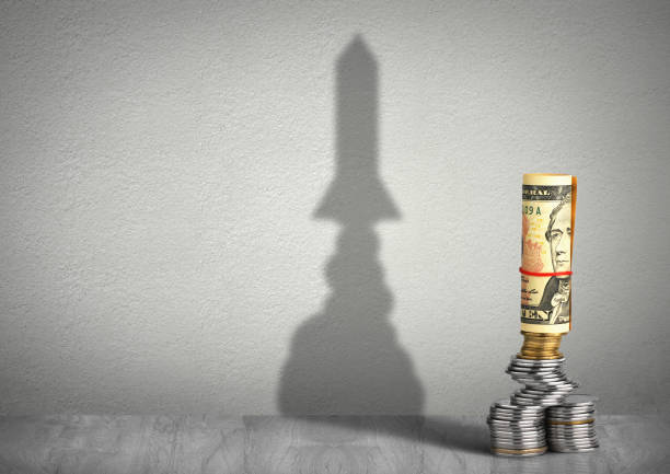 financial growth concept, money with rocket shadow