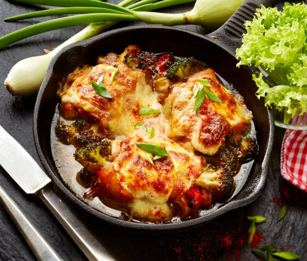 istock Roasted teriyaki chicken thighs  stuffed with vegetables 654643390