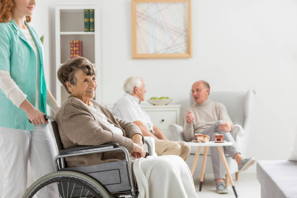 istock Nurse and disabled woman 654651604