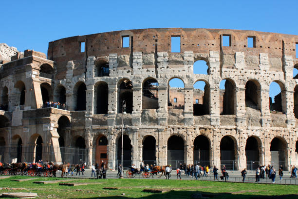 istock Coloseum against bright bluse sky in Rome Italy 654654848