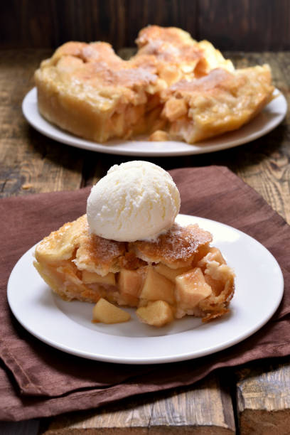 istock Piece of apple pie served with ice cream 654659576