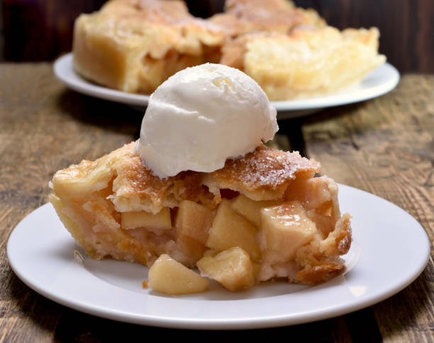 istock Piece of apple pie served with ice cream 654659596