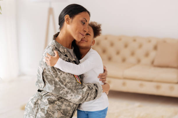 istock Adorable mother and child hugging each other 654662240