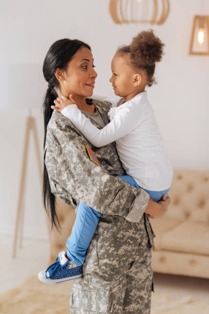 istock Emotional gorgeous lady telling her daughter about her trip 654662552