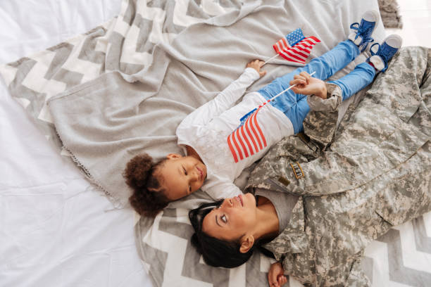 istock Cute charming ladies daydreaming in bed 654668632