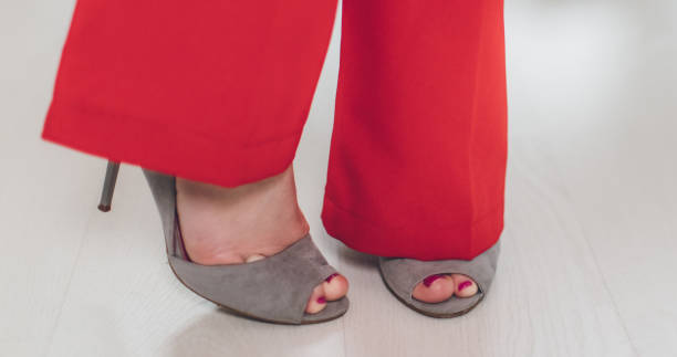 istock Woman in red shoes 654672674