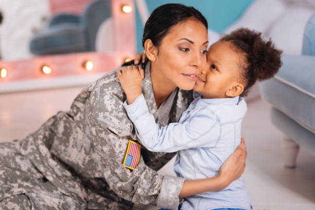 istock Cute bright girl telling her mom a secret 654673102