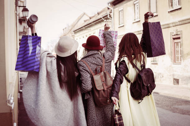 istock Three best friends enjoying in shopping. 654689128