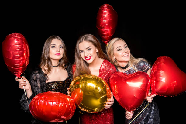 istock Gorgeous women with balloons 654704080