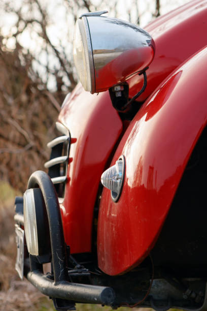 Heidenheim, Germany - March 13, 2017: Close-up photo of the front of a red Citroen 2CV car.