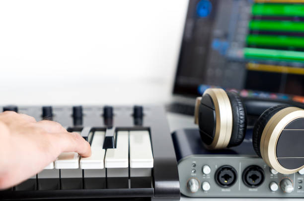 istock Musician is recording Portable Computer Music Studio home set up 654722180