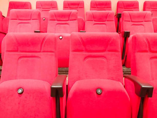 istock empty red cinema or theater seats 654734608