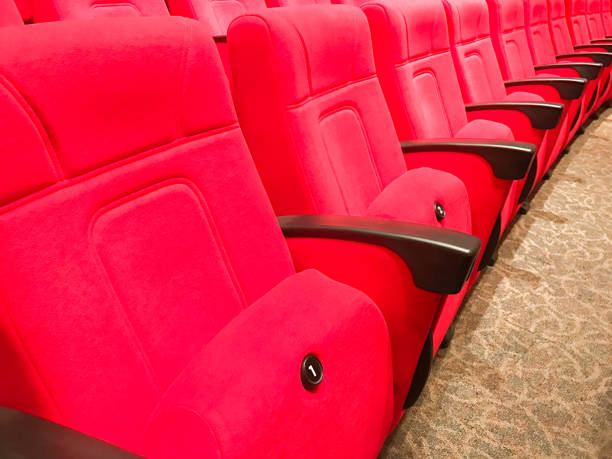 istock empty red cinema or theater seats 654734772