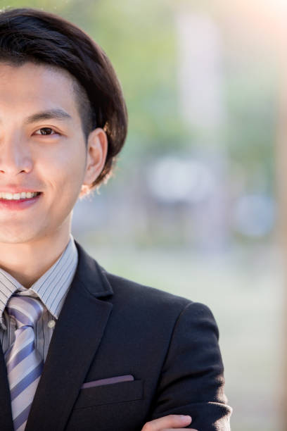 istock businessman smile to you 654734776