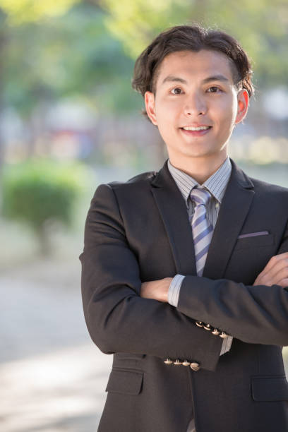istock businessman smile to you 654743592