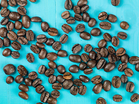 Coffee Beans Against a Blue Background