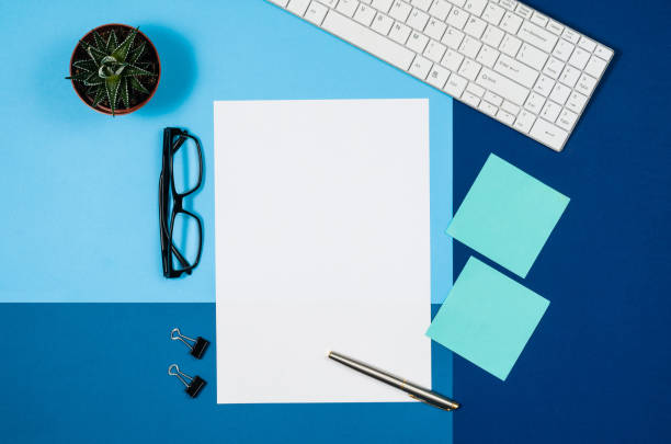 Mock-up blank page or magazine on colorful background top view
