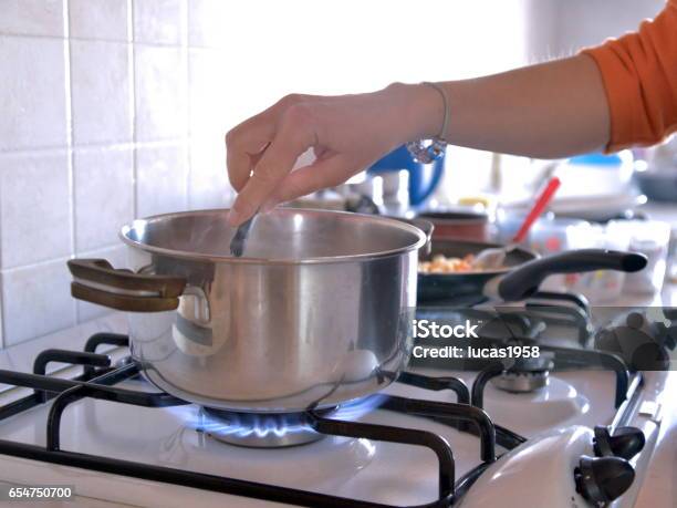 Cooking At Home Stock Photo - Download Image Now - Gas Stove Burner, Cooking, Kitchen