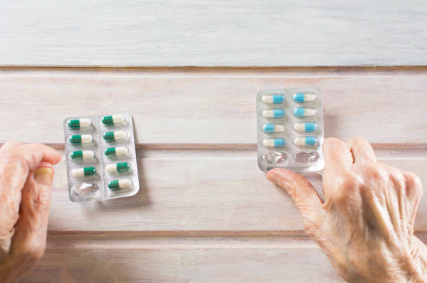 istock Senior woman picking her today pills 654759946