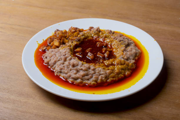 istock A plate of mashed beans with red palm oil 654764146