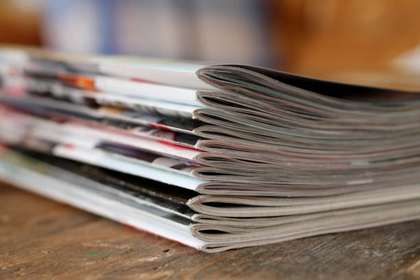 istock Magazines on the wooden table 654767314