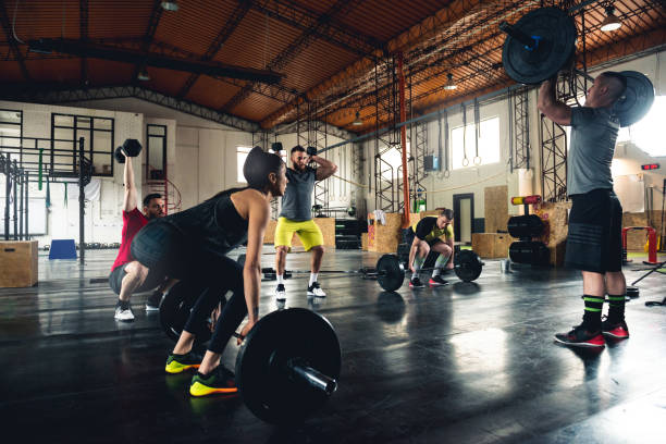 istock People exercising in the gym 654767438