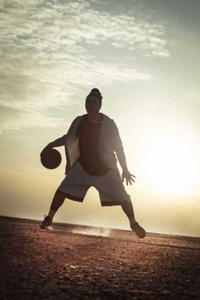 istock Street basketball at sunset 654774686