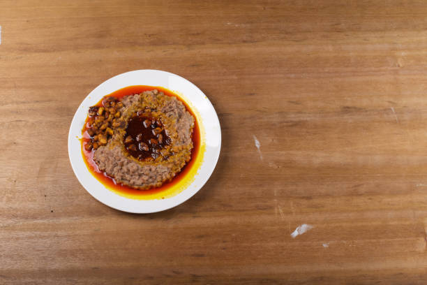 istock A plate of mashed beans with red palm oil 654775002