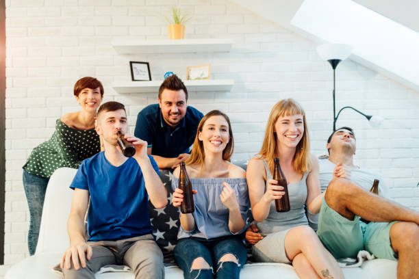 istock Young people at home party 654775418