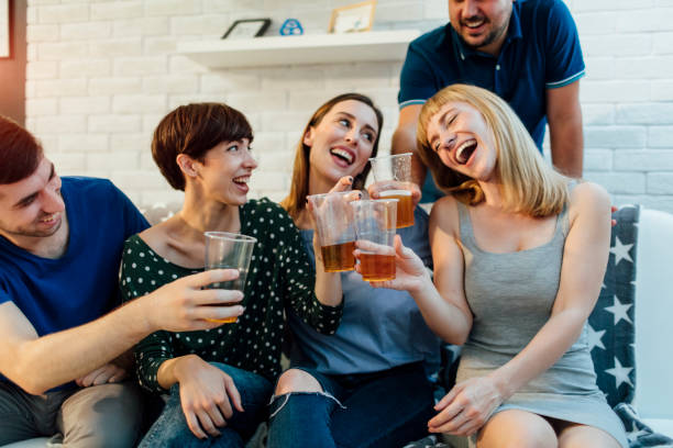 istock Young people at home party 654778644
