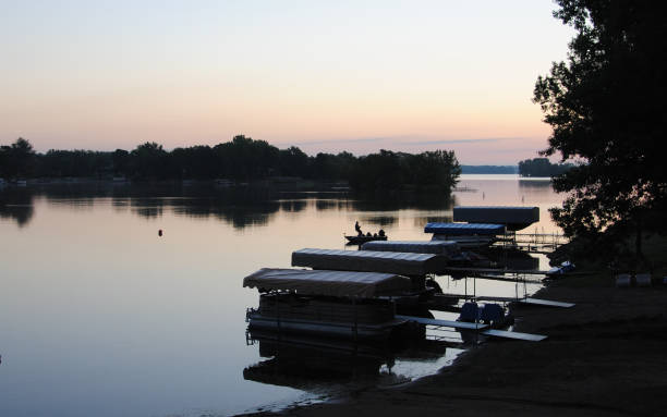 istock Quiet dawn on a calm lake 654778728