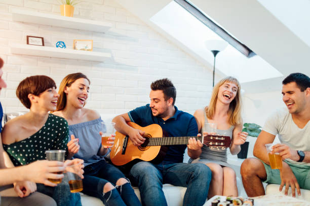 istock Young people at home party 654778828