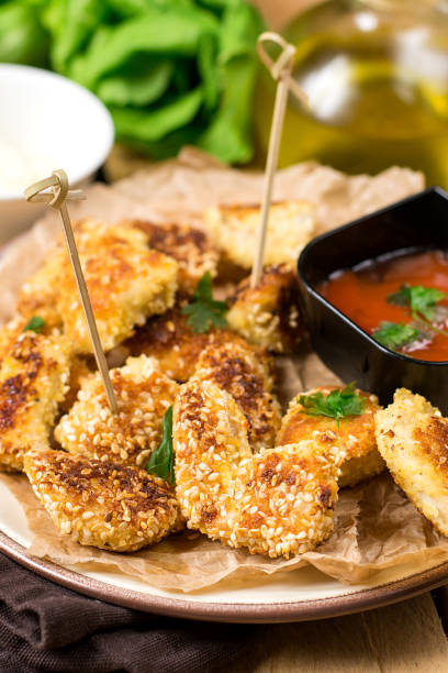 istock Breaded chicken nuggets with sesame seeds 654781498