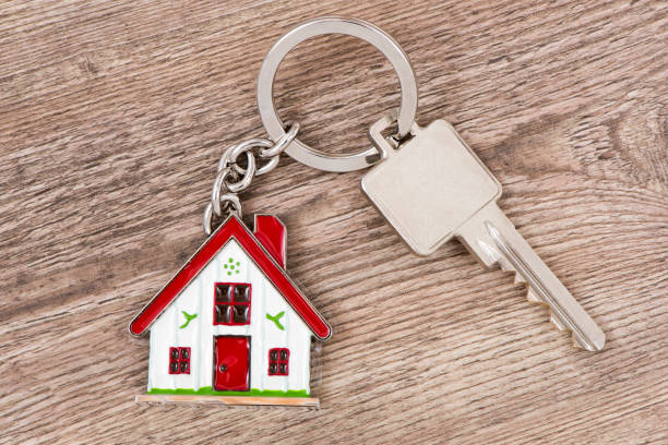 house key house key on keyring keyring charm stock pictures, royalty-free photos & images