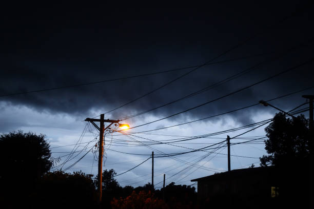 istock Street light at night with a stormy sky background 654784616