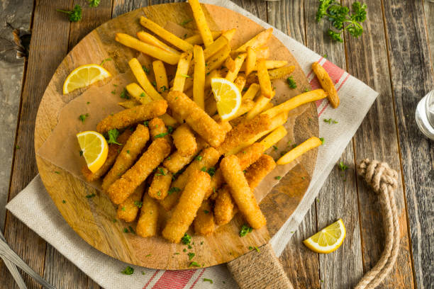 istock Deep Fried Fish Sticks with French Fries 654785014