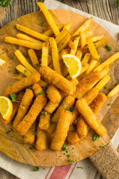istock Deep Fried Fish Sticks with French Fries 654785606