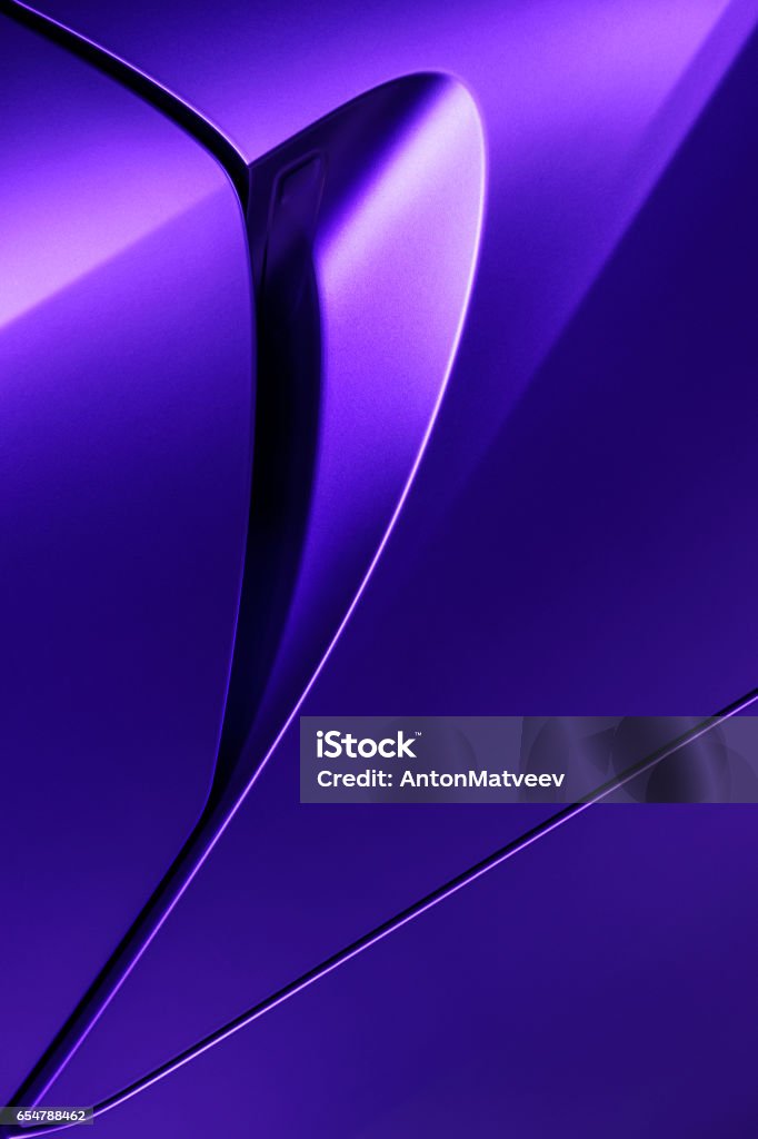 Lilac sedan bodywork Bodywork of lilac sedan, surface of sport car door and handle in ultramodern style, detail of concept racing vehicle Car Stock Photo