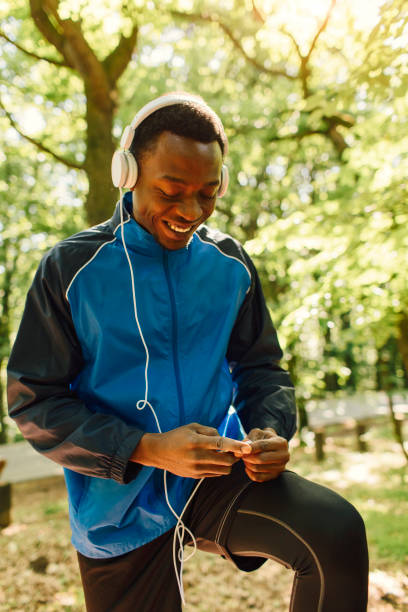 istock Male athlete  in park 654791240